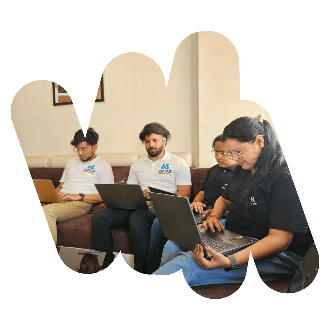 CNEAR team working on laptops to develop Falcon AI placement platform